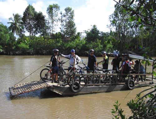 A day trip cycling to Caibe countryside, by ferry boats and by bike in Mekong Delta