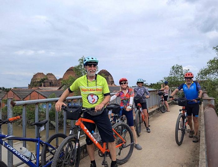 Venture through Ben Tre, explore Mekong's Kingdom pottery, overnight in Sadec before riding to Xeo Quyt forest.