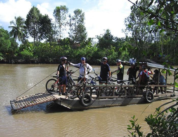 A day trip cycling to Caibe countryside, by ferry boats and by bike in Mekong Delta