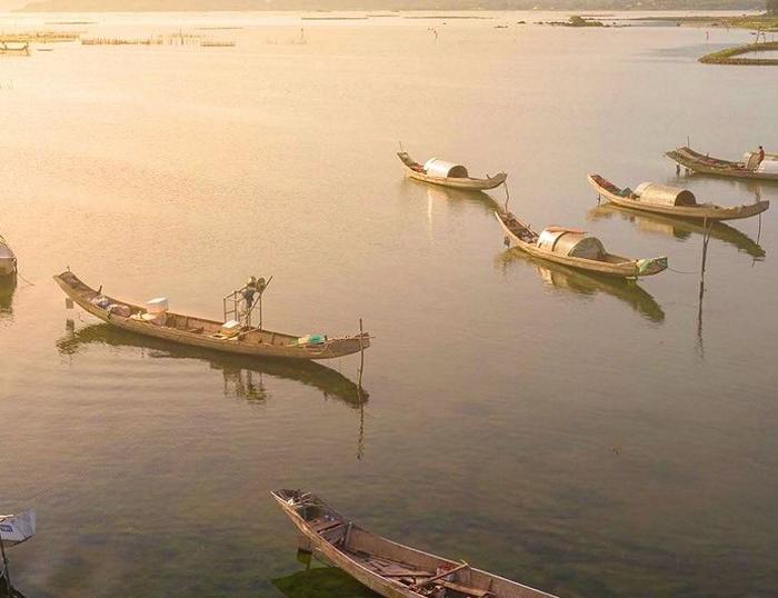 a day trip cycling from Hoi An to Hue, gear up for Hai Van Pass, pedal along the coastline of Thuan An