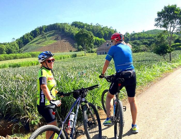 Vietnam Cycling Holidays, bike to Mai Chau, explore Cuc Phuong Park, enjoy stunning landscapes of Tam Coc natural beauty.